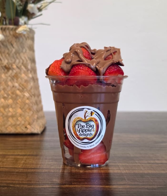 Cup of fresh strawberries covered in rich Belgian chocolate from Big Apple Delights